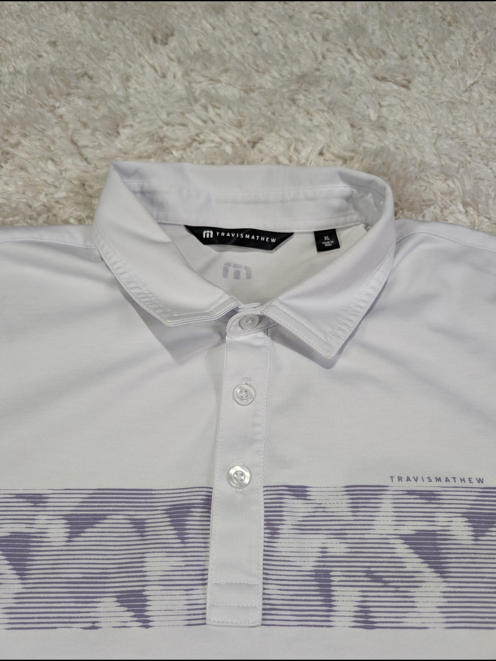 Travis Mathew White Polo with Light Lavender Stripe Accent